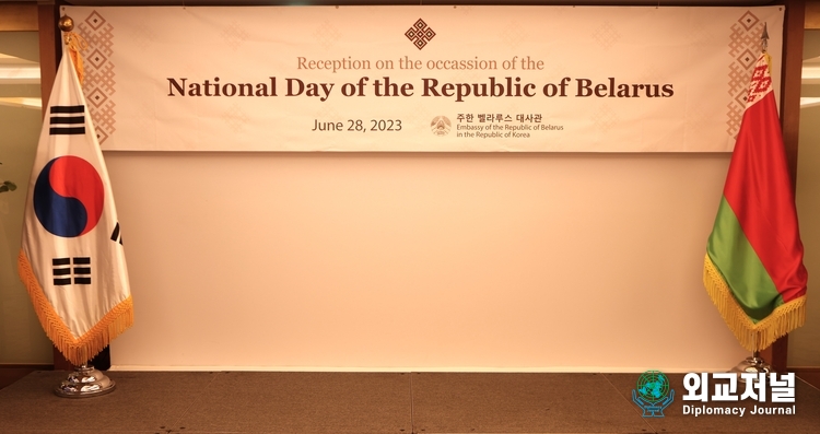 Two national flags of Belarus and South Korea are displayed at the stage set up to commemorate the National Day of Belarus at Lotte Hotel in Seoul on June 28.